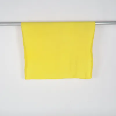Filt (yellow blanket, bright yellow textile, fleece blanket, soft throw, cozy blanket, home textile, minimal design, solid color blanket, scandinavian style, nordic home, cozy home decor, simple aesthetic, modern home, vibrant color, bold yellow, sunshine aesthetic, warm tones, soft fabric, lightweight blanket, everyday blanket, sofa throw, bed throw, minimal decor, clean aesthetic, home styling, interior decor, hygge style, comfort home, relaxation vibe, y2k home decor, y2k aesthetic, 2000s style, 2000s aesthetic, tiktok home, tiktok aesthetic, trending decor) från Kotikulta Polyester