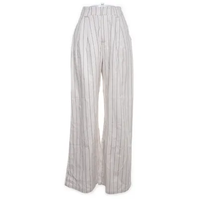 Palazzo pants (Beige, Black) from Dissh Cotton, Linen