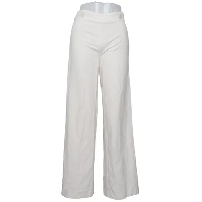 Pantalon patte d'éléphant (Blanc) de Rue de Femme