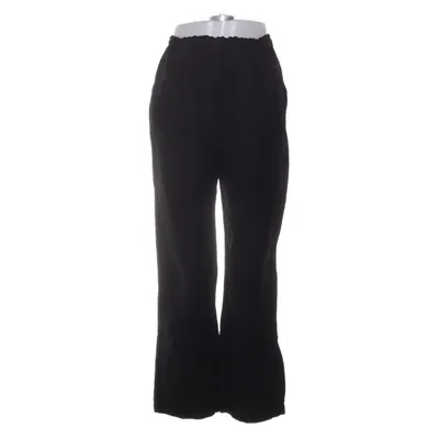 Pantalon patte d'éléphant (Noir) de Totême