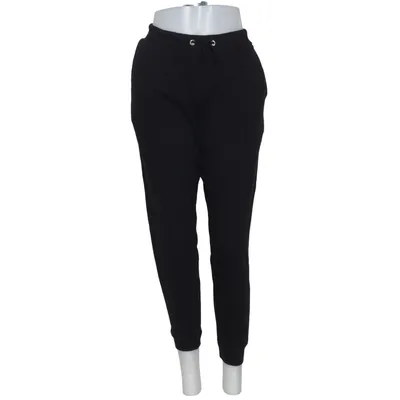 Pantalon de survêtement (Noir) de Essentials Coton, Polyester