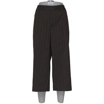 Pantalon patte d'éléphant (Marron) de Curly Acrylique, Polyester