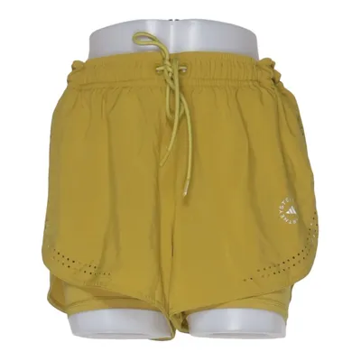 Sports shorts (Soepele trainingsshort met een ondersteunende, stretchy ingebouwde legging in een opvallende maar mooie mosterdgele kleur. Ademende lichtgewicht stof. Elastische taille die je nog doormiddel van een veter vast kan maken. ) from Adidas by Stella McCartney