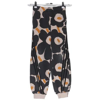 Pantalon de survêtement (Noir, Beige, Jaune) de Adidas x Marimekko Coton recyclé, Polyester recyclé
