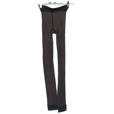 Panty (Warm & Transparent) van DIM Elastaan, Polyamide, Polyester