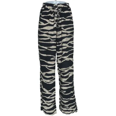 Palazzo pants (Black, Beige) from H&M Polyamide, Viscose