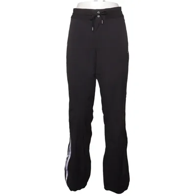Joggers (Black, White) from Adidas