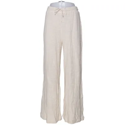 Pantalon patte d'éléphant (Beige) de By Aylin Koenig Coton