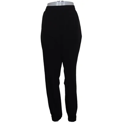 Trainingsbroek (H&M Move, H&M Move joggers, H&M Move sweatpants, black sweatpants, athletic pants, sports pants, training pants, workout pants, gym pants, activewear, fitness wear, running pants, jogging pants, exercise clothing, yoga pants, lounge pants, casual pants, comfortable trousers, relaxed fit, elastic waist, tapered pants, minimalist fashion, everyday wear, athleisure, sportswear, gym outfit, active lifestyle, breathable fabric, soft fabric, comfort wear, streetwear, urban fashion, oversized style, unisex clothing, women's sportswear, men's sportswear, black activewear, monochrome style, basic essentials, capsule wardrobe, travel clothing, homewear, loungewear, warm up pants, fitness apparel, TikTok fashion, Instagram style, Pinterest fashion, viral fashion, casual style, modern fashion, premium basics, outdoor wear, hiking outfit, walking pants, everyday outfit, workout essentials, sporty look, fashion basics, training gear, active fashion, stretch pants, athletic clothing, gym essentials, running gear, yoga outfit, comfortable fit, stylish activewear, black joggers, leisurewear, versatile clothing, performance wear, sports fashion, minimal style, classic black pants, everyday essentials, H&M sportswear, move collection, fitness clothing, trendy activewear, urban essentials, casual comfort, relaxed style, functional clothing, lightweight pants, sports lifestyle, athleisure fashion, comfortable activewear, weekend wear, daily wear, classic joggers, essential wardrobe) van H&M Move Elastaan, Polyester