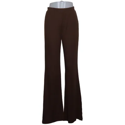 Pantalon patte d'éléphant (Marron) de Hanna Schönberg x NA-KD Élasthane, Polyester