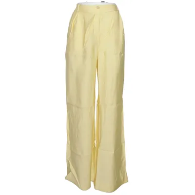 Palazzobyxor (Gul) från An'ge Polyester, Viskos