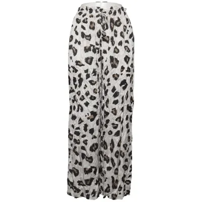 Pantalon patte d'éléphant (Blanc, Noir, Marron) de Monday Swimwear