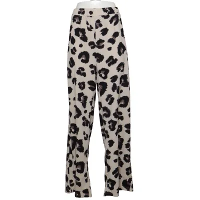 Pantalon patte d'éléphant (Beige, Noir) de Kapalua Élasthane, Polyester