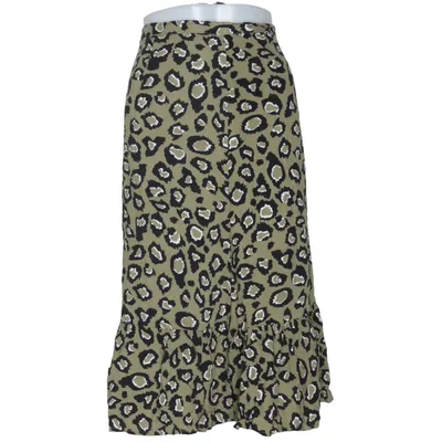 Jupe portefeuille (Vert, Noir, Blanc) de Pure Instinct