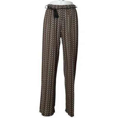 Pantalon patte d'éléphant (Marron, Noir, Blanc) de Charlotte Polyester