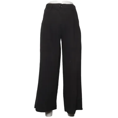 Pantalon patte d'éléphant (Noir) de Mimosa Élasthane, Polyester