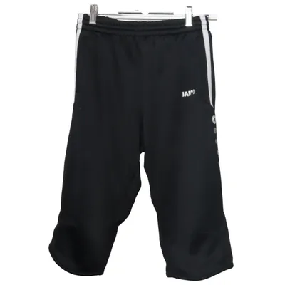 Joggers (Black, White) from Jako