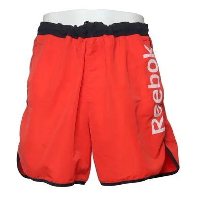 Swim shorts (Orange, Black) from Reebok