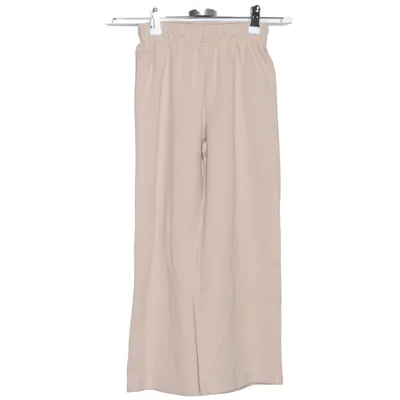 Pantalon patte d'éléphant (Beige) de Zara