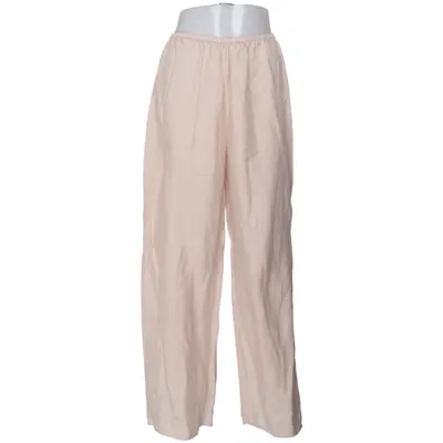 Pantalon patte d'éléphant (Beige) de Arket Cupro