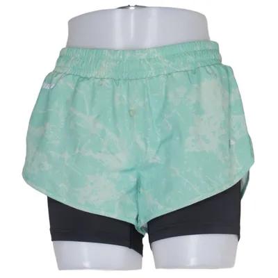 Sports shorts (Green, Black) from Karhu Elastane, Polyester
