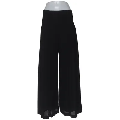 Pantalon patte d'éléphant (Noir) de Molly Jo Polyester