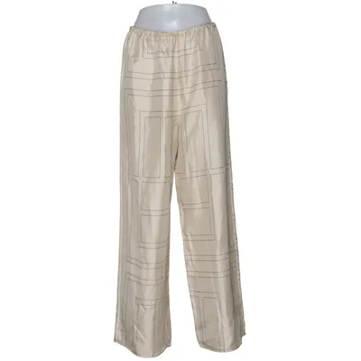 Palazzobyxor (Beige) från Totême Silke