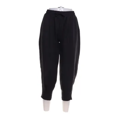 Pantalon patte d'éléphant (Noir) de Rita Polyester