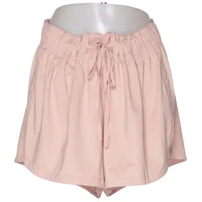 Short de sport (Rose) de H&M Sport Polyester, Élasthane