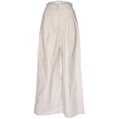 Palazzobyxor (Beige) från Nude Polyuretan, Viskos