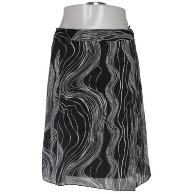 Kjol (Svart, Vit) från Mana Polyester