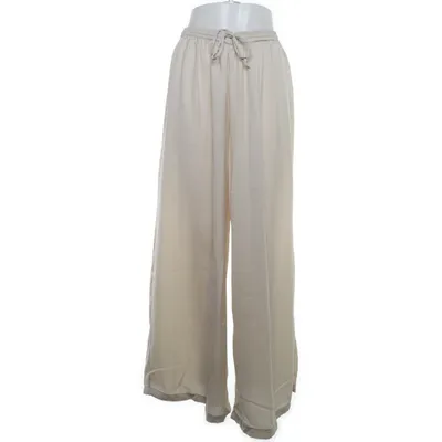 Pantalon patte d'éléphant (Beige) de NA-KD Polyester