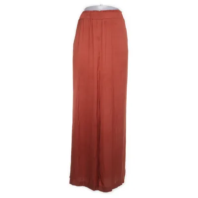 Pantalon patte d'éléphant (Orange) de Trend One Young Polyester