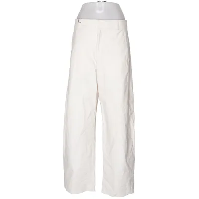 Chino (Beige) de Uniqlo Coton, Élasthane, Polybutylène, Polyester