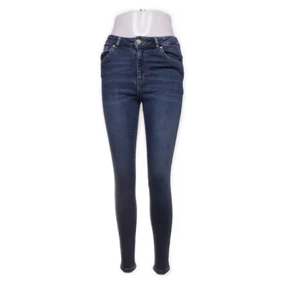 Jean (Bleu) de Never Denim Coton, Élasthane, Polyester