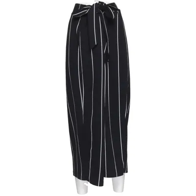 Pantalon patte d'éléphant (Noir, Blanc) de City Chic Élasthane, Polyester