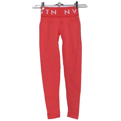 Sportleggings (Rood) van NVGTN Elastaan, Polyamide