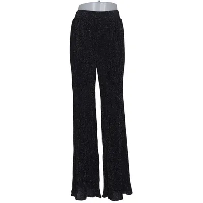 Palazzo pants (Black, Silver) from Mango Suit