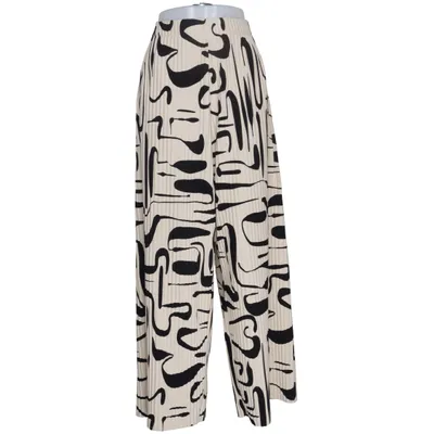 Palazzo pants (Beige, Black) from COS Elastane, Polyester