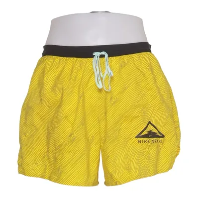 Sports shorts (Yellow) from Nike Trail Elastane, Polyester