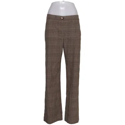 Pantalon patte d'éléphant (Marron) de Claire Woman