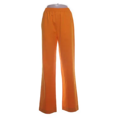 Palazzo pants (Orange) from C'est Normal Elastane, Polyester