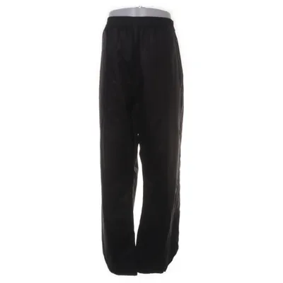 Regnbyxor (Svart) från On the Peak Polyester