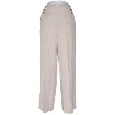 Pantalon patte d'éléphant (Beige) de Godiva Lin