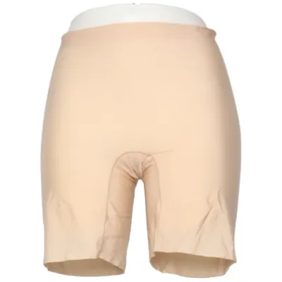 Bas de vêtement sculptant (Beige) de Skims