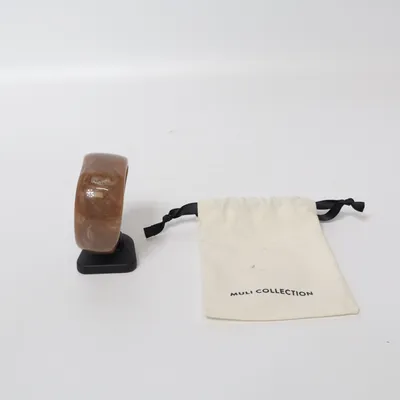 Armlet (Brown) from Muli Plastic
