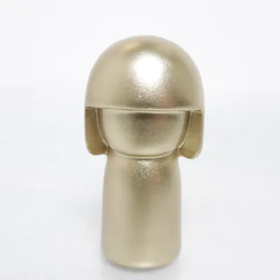 Kokeshi (Guldfärgad) från Skincity
