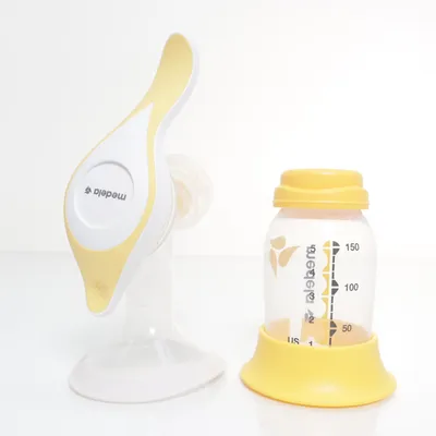 Bröstpump (Vit, Gul) från Medela