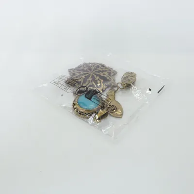 Broche (Or, Noir, Turquoise) Métal inconnu