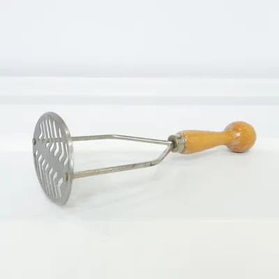 Potato press (Brown, Silver) from Rostfritt